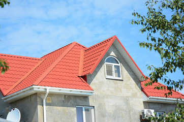 House renovation and repair with new roof, stucco, plastering and painting walls