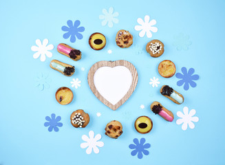 Pastries on trendy blue background.