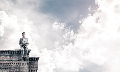 Young businessman or student studying the science on building ro
