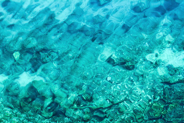 Fototapeta na wymiar background of transparent sea water and bottom