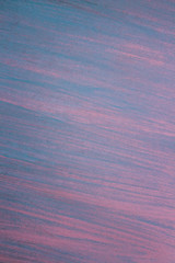 blue pink background with hand-made texture in shades of the sky at sunset