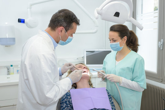 patient with two dentists