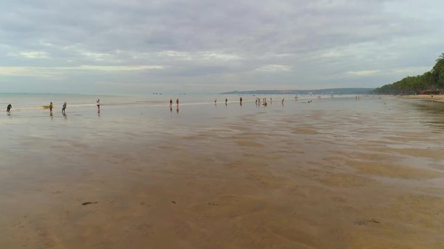Mui Ne Vietnam Locals on the bech Aerial view Cloud sky