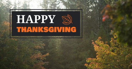 Happy thanksgiving text with forest trees in Autumn