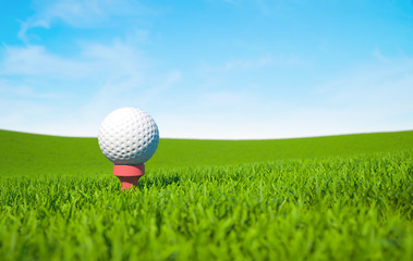 Golf ball on green grass