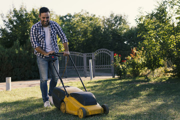 Man and lawnmower