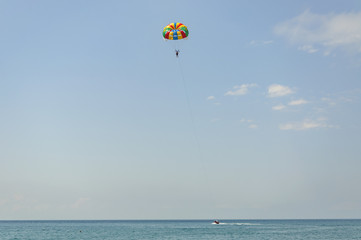 Skydiver over the sea