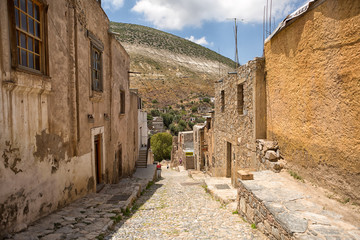 Fototapeta na wymiar Real de Catorce, Mexico: narrow cobblestone streets and mostly abandoned stone buildings all through the town once known for silver mining