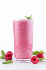 Raspberry smoothie in a tall glass