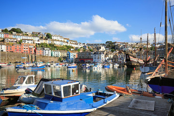 Fototapeta na wymiar Brixham Harbour is a popular place for tourists to visit in the summer months
