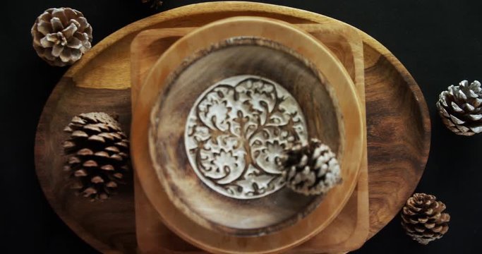 Various cutlery on wooden table 