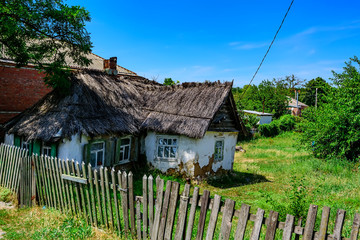 Fototapeta na wymiar House in countryside with reed roof