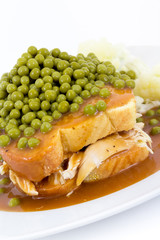hot chicken sandwich with green peas