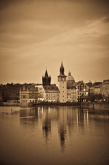 Fototapeta na wymiar Church at the Edge of the River in Prague