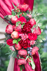red coloured wedding arch for wedding ceremony