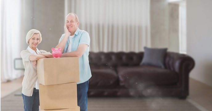 People Moving Boxes Into New Home