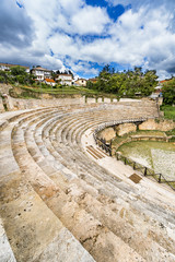 Ohrid - Macedonia. The antique ancient greek amphitheater or antique theatre of Ohrid with view on old town of Ohrid and Lake Ohrid in Macedonia, vertical