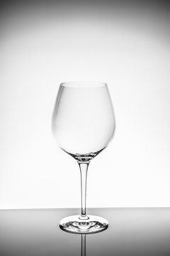 Red wine glass  on the light background