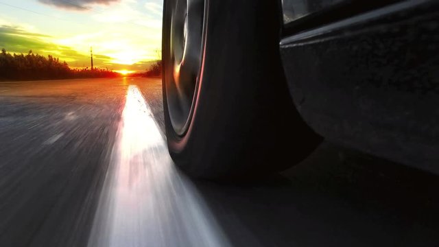 Fast sport car drive on asphalt road toward sunset, POV 