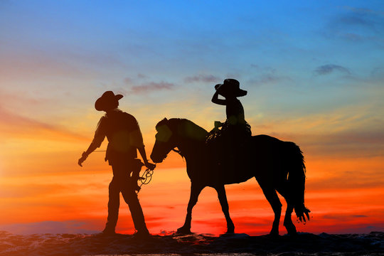  silhouette, girl riding a horse on the beach