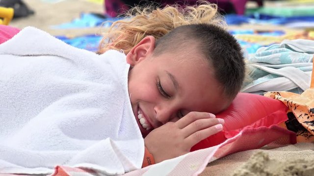 Happy boy smiling tickled by mother. Family joy on vacation 