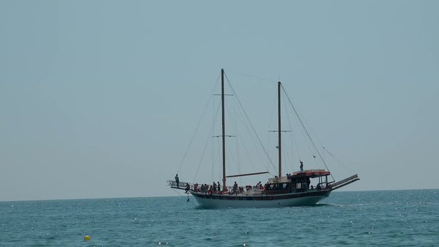 Refugees arriving in Greece in old sail boat from Turkey. 