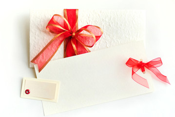 White card with red bow with free copyspace