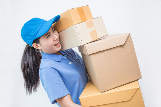 Portrait Of Happy Delivery Asian Woman Her Hands Holding Cardboard Box Isolated On White Background, Young Asian Woman Carry Heavy Over Load Brown Box Delivery Service Concept