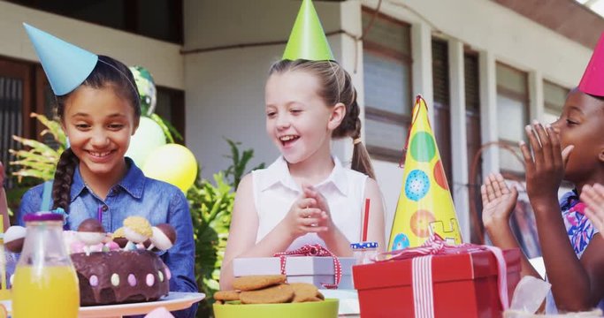 Group of kids celebrating their friend birthday 