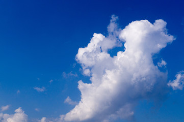 bright blue sky with clouds and sun. cumulus, background, weather.