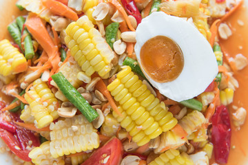spicy corn salad with salted egg,Thai style food