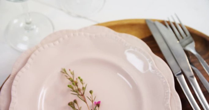 Various cutlery on wooden table 
