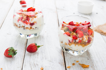 Strawberry , granola and yogurt healthy breakfast parfait