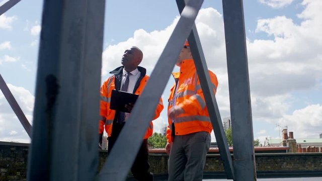  Engineers carrying out an inspection at urban industrial site