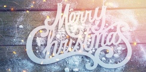 Merry Christmas text with artificial snow
