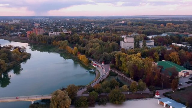 Aerial view on Mirgorod city, Ukraine. Old video style, low light evening sunset autumn footage