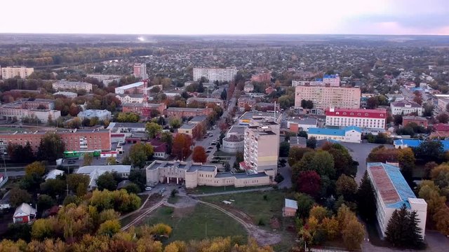 Aerial view on Mirgorod city, Ukraine. Old video style, low light evening sunset autumn footage