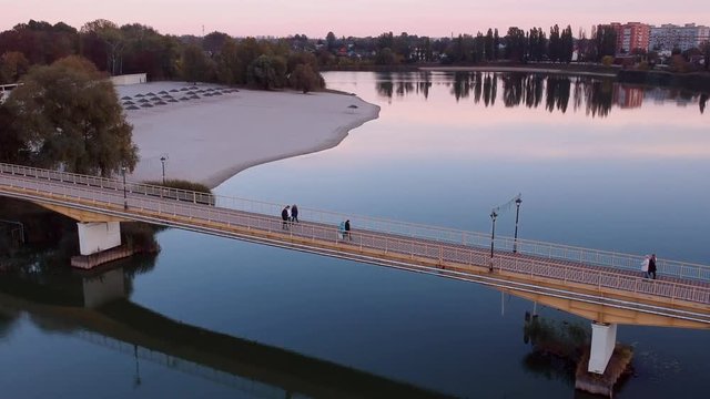 Aerial view on Mirgorod city, Ukraine. Old video style, low light evening sunset autumn footage
