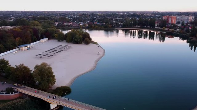 Aerial view on Mirgorod city, Ukraine. Old video style, low light evening sunset autumn footage