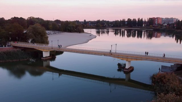 Aerial view on Mirgorod city, Ukraine. Old video style, low light evening sunset autumn footage