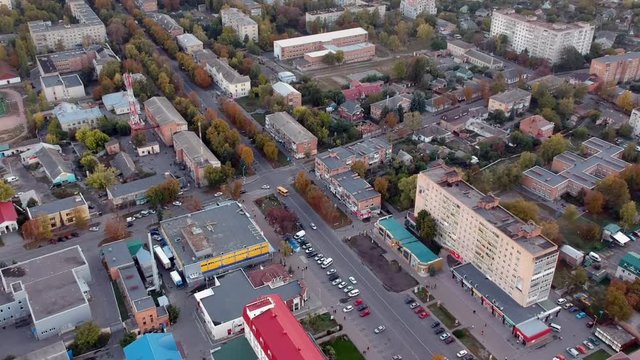 Aerial view on Mirgorod city, Ukraine. Old video style, low light evening sunset autumn footage