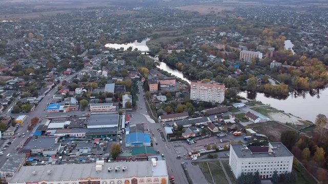 Aerial view on Mirgorod city, Ukraine. Old video style, low light evening sunset autumn footage