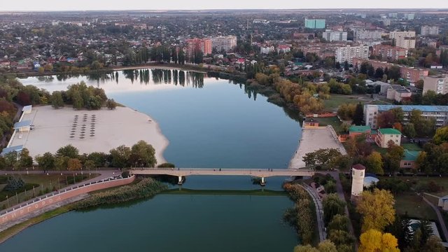 Aerial view on Mirgorod city, Ukraine. Old video style, low light evening sunset autumn footage