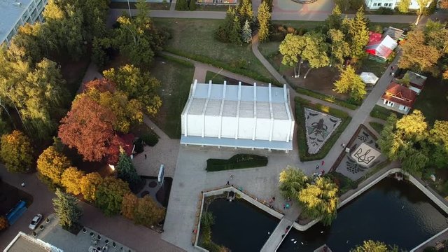 Aerial view on Mirgorod city, Ukraine. Old video style, low light evening sunset autumn footage