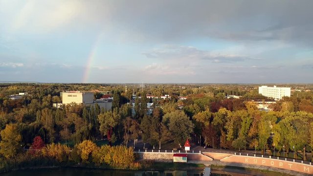 Aerial view on Mirgorod city, Ukraine. Old video style, low light evening sunset autumn footage