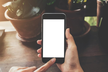 A man hand holding smart phone. mobile  with blank screen and can be add your texts or others.