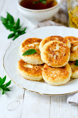 Obraz na płótnie Canvas Cottage cheese pancakes with honey