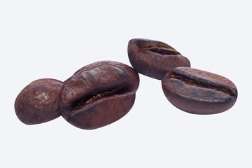 The coffee beans close up  isolated on white background