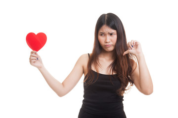 Asian woman thumbs down with red heart.