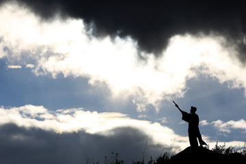 Fighter with a sword silhouette a sky ninja